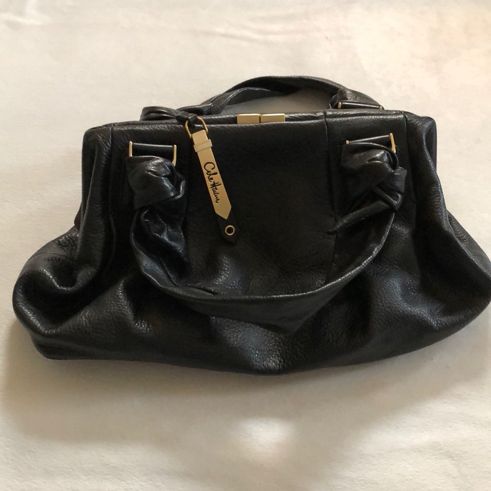 Cole Haan top lock purse offers welcome